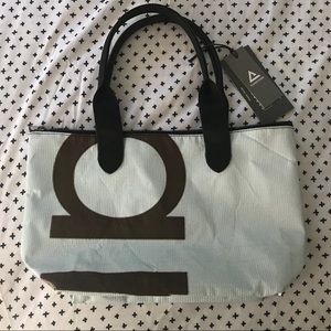 Rareform repurposed billboard purse